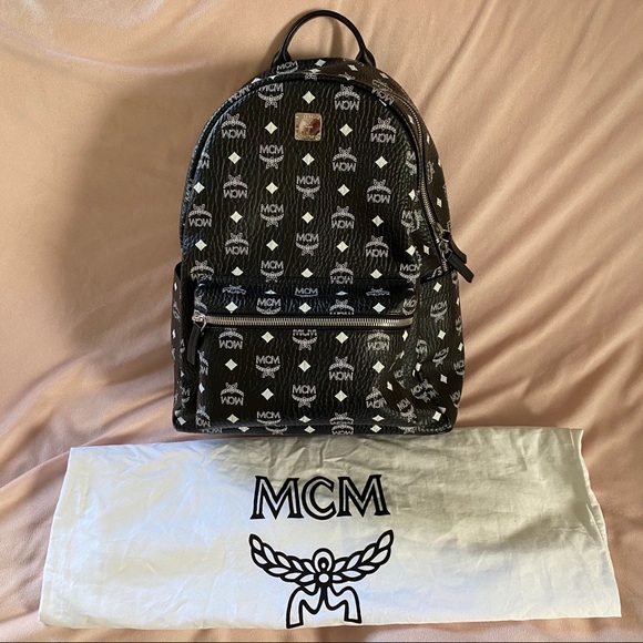 white mcm backpack